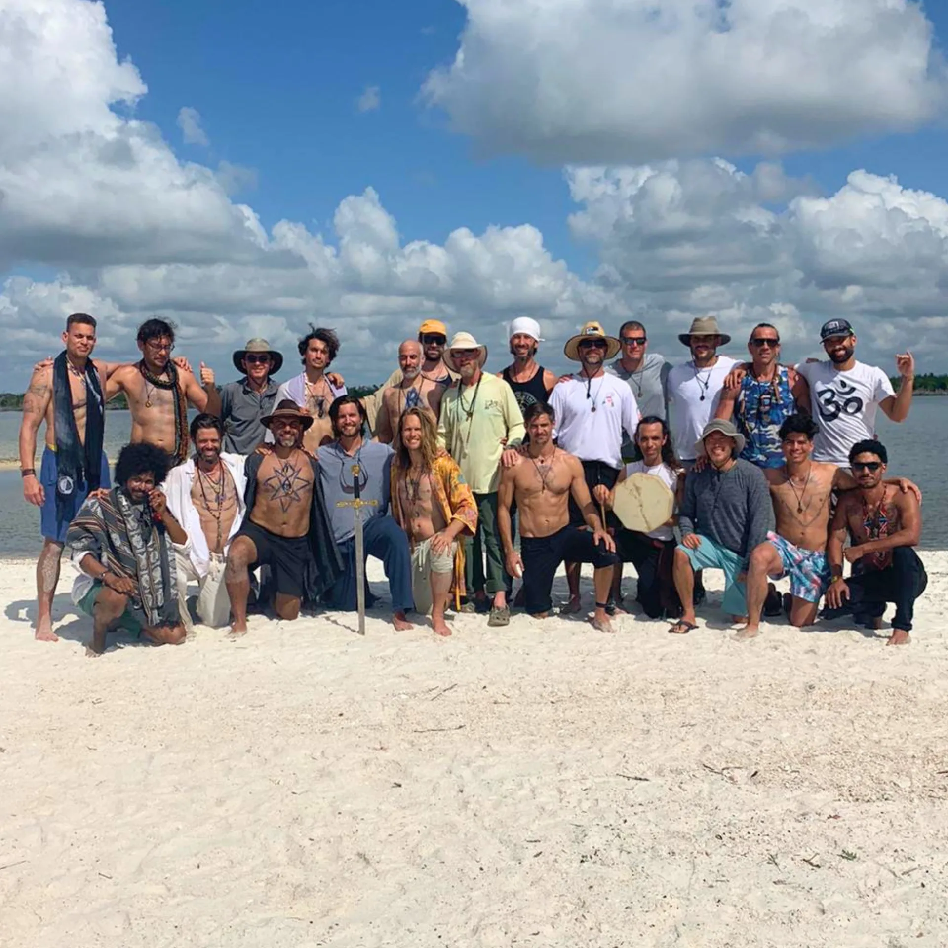 Men on the beach at a retreat