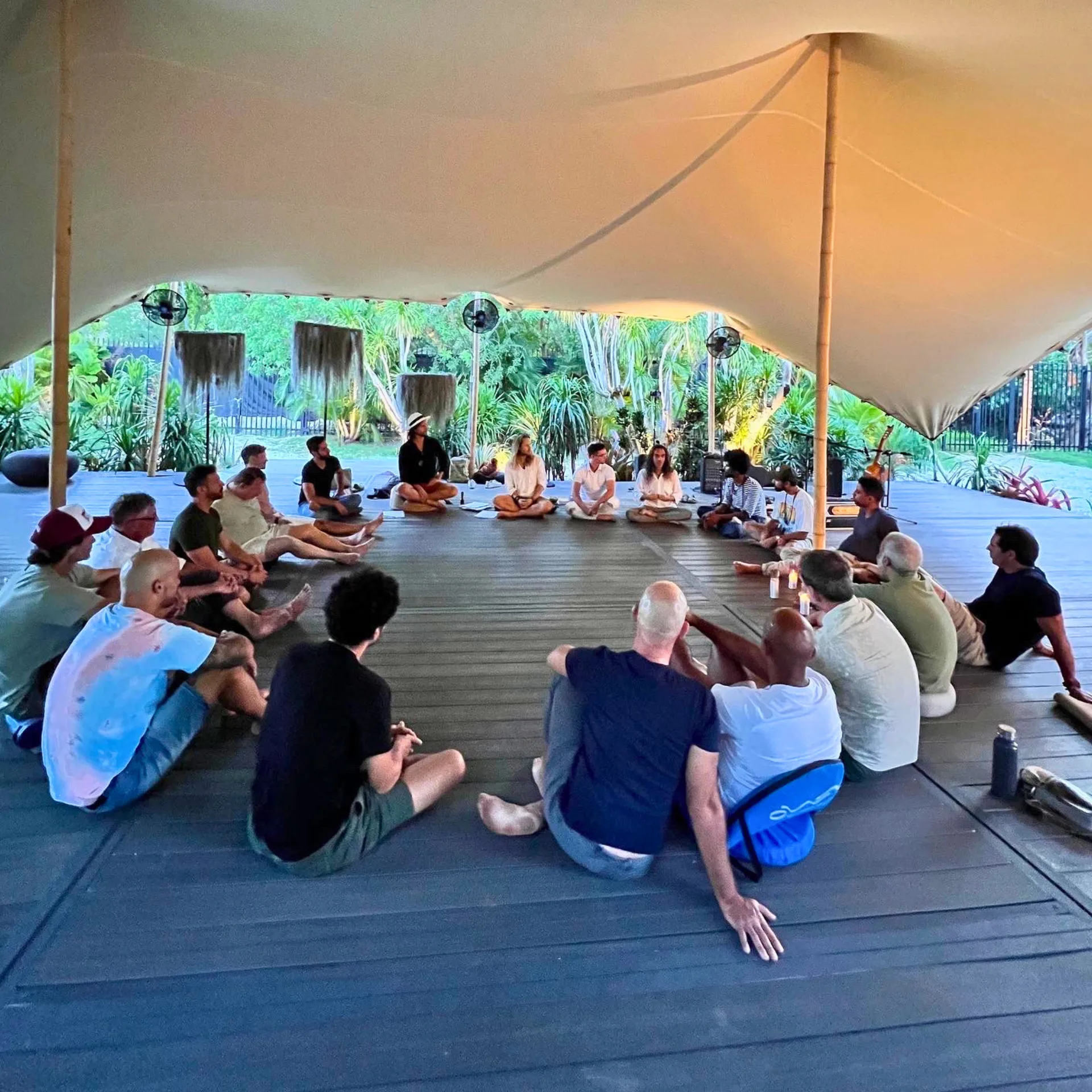 Men in a circle at a workshop